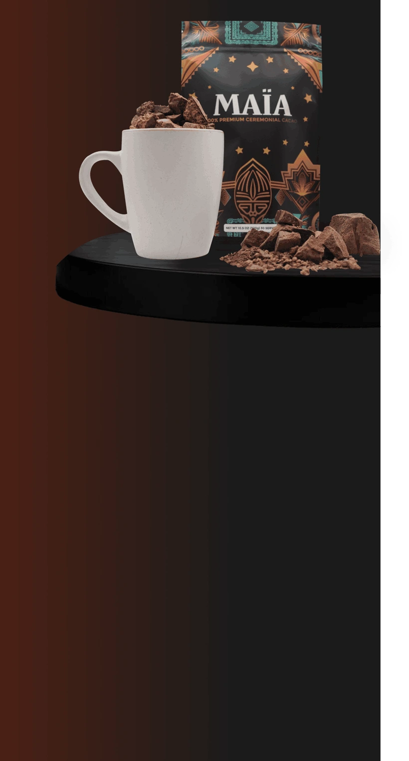 White mug with chocolate chunks, next to a decorative cacao package.